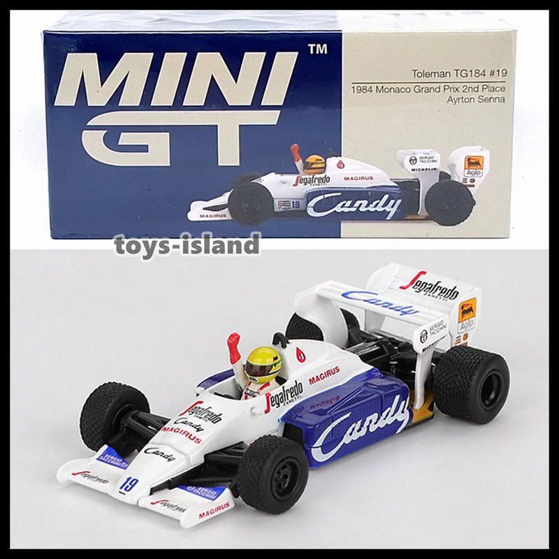 MINI GT die-cast race car model in white and blue with black tires, front 3/4 view