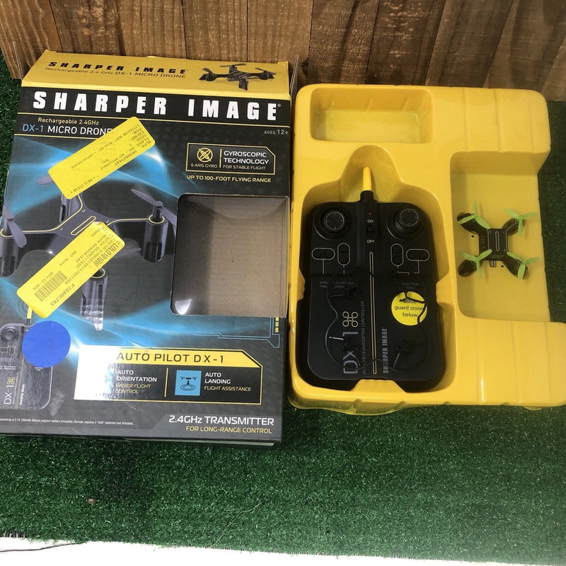 Black micro drone DX-1 transmitter controller with buttons and joystick grips in case