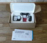GoPro HERO13 action camera in open case with mounts and cables