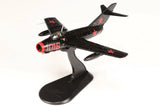 Hobby Master 1/72 MiG-15 Fagot model airplane on display stand, black with red stars