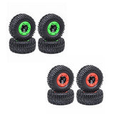 RC short course tire and wheel set, black tires with green and red wheel hubs
