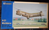 H-21 Workhorse helicopter model kit box art, tan and gray tandem rotor aircraft
