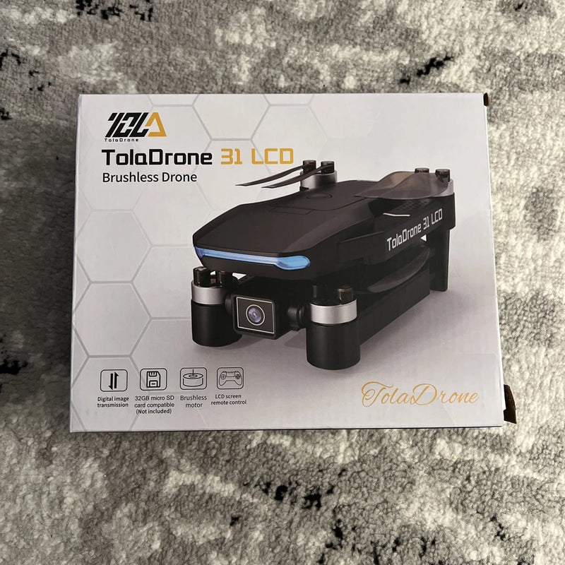 ToloDrone 31 LCD brushless drone product box with drone and camera graphic
