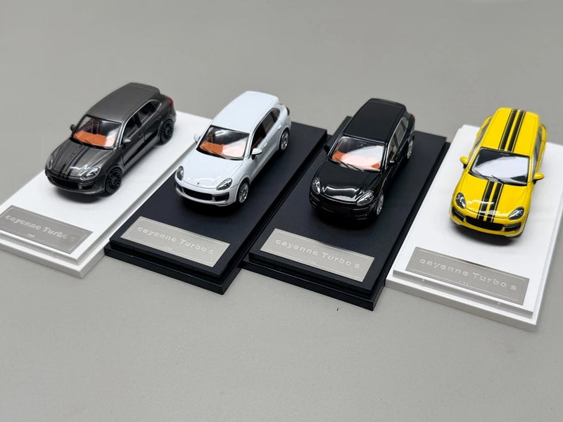 Alloy Porsche Cayenne Turbo 2014 model cars set of four in black, white, dark, and yellow