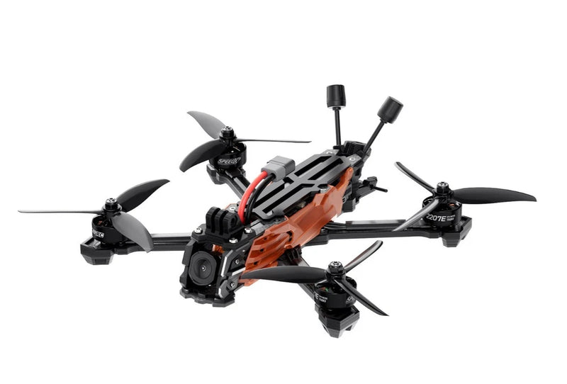 FPV quadcopter drone with orange-and-black frame and four propeller arms