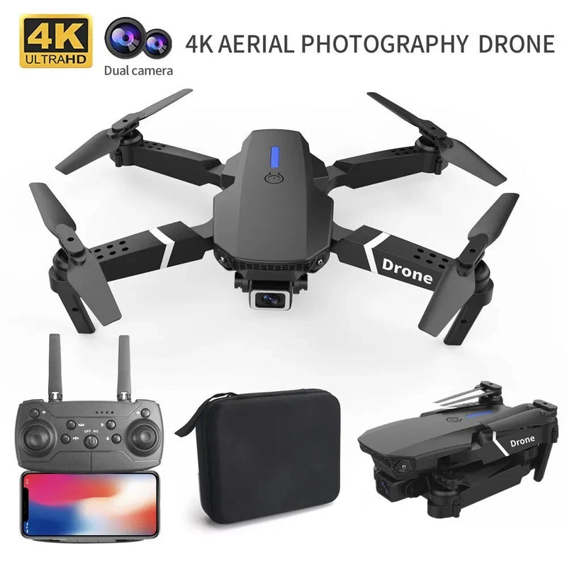 Black quadcopter drone with mounted camera, handheld controller, and carrying case