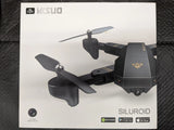 Black quadcopter drone with camera and folding propellers