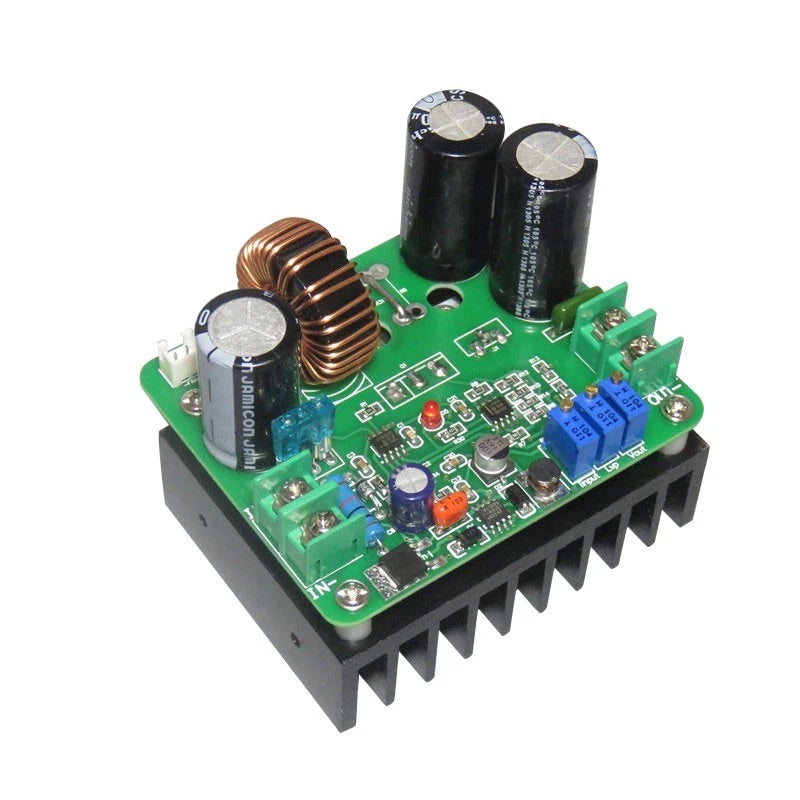 DC-DC boost converter module with green PCB, copper inductor, and heatsink fins