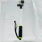GoPro HERO4 action camera on white extension pole with black grip