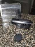 ContourROAM action camcorder with lens and black base cap