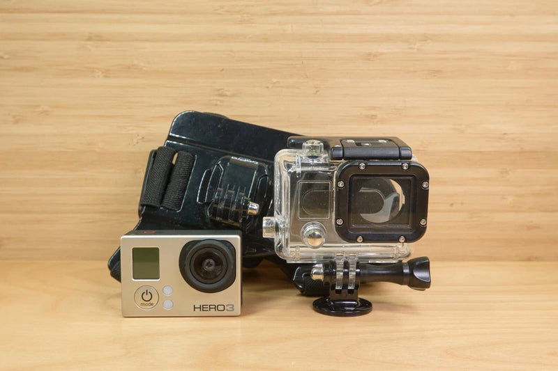 GoPro HERO3 Silver Edition action camera with clear waterproof housing and lens