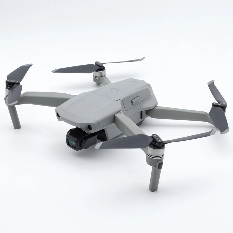 DJI Mavic Air 2 drone with four propellers, gray body and rear camera gimbal