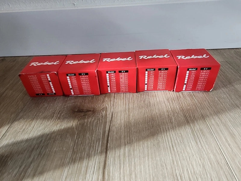 Lot of five red boxed brushless drone motors with label panels