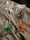 FPV antenna set with green and orange ring-mount antennas in clear plastic bags