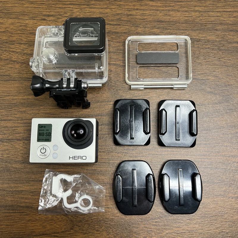 GoPro HERO3 action camera with clear protective case and black mounting brackets