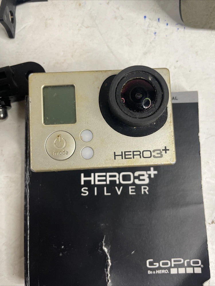 GoPro HERO3+ Silver action camera with front lens and LCD screen, HERO3+ SILVER label