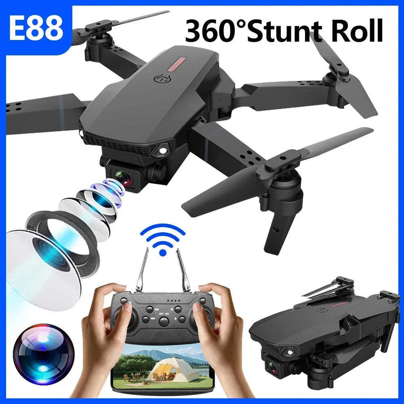 Folding mini quadcopter drone with remote controller and phone, propellers extended