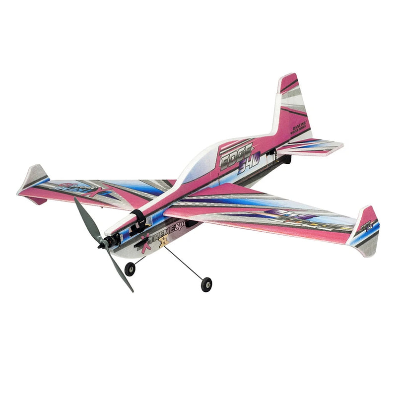 Pink, blue, and white sport RC airplane with tricycle landing gear and propeller.