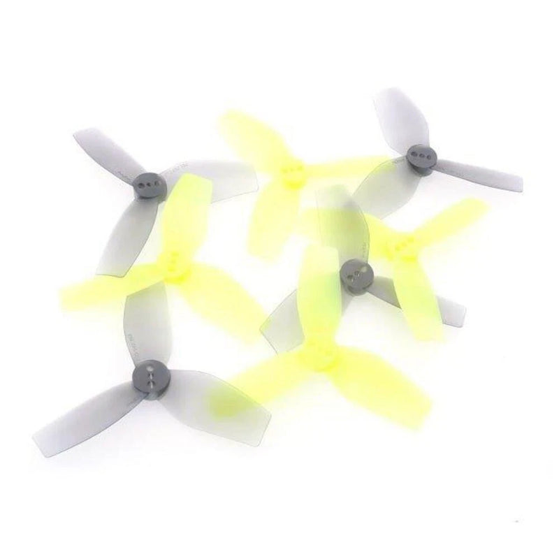 Tri-blade drone propellers with gray hubs and light-colored blades