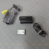 Black Sony HD action camcorder kit with clear case, battery, and connecting cable set