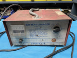 Christie Battery Charger Model 248A.  Tested  Output While Charging. Works Good. Battery