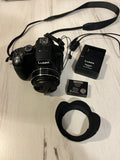 LUMIX Panasonic DMC-FZ200 with Hood Lens, Charger, 2 CDs, and Instruction Manual