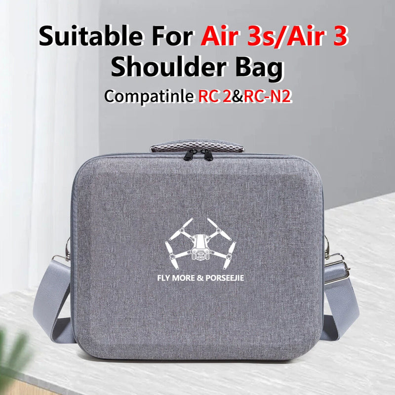 Gray zippered shoulder storage bag for drone, with front emblem and shoulder strap