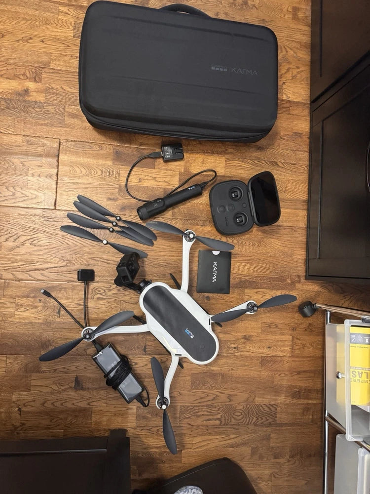 GoPro Karma drone parts kit with controller, batteries, propellers, and hard case