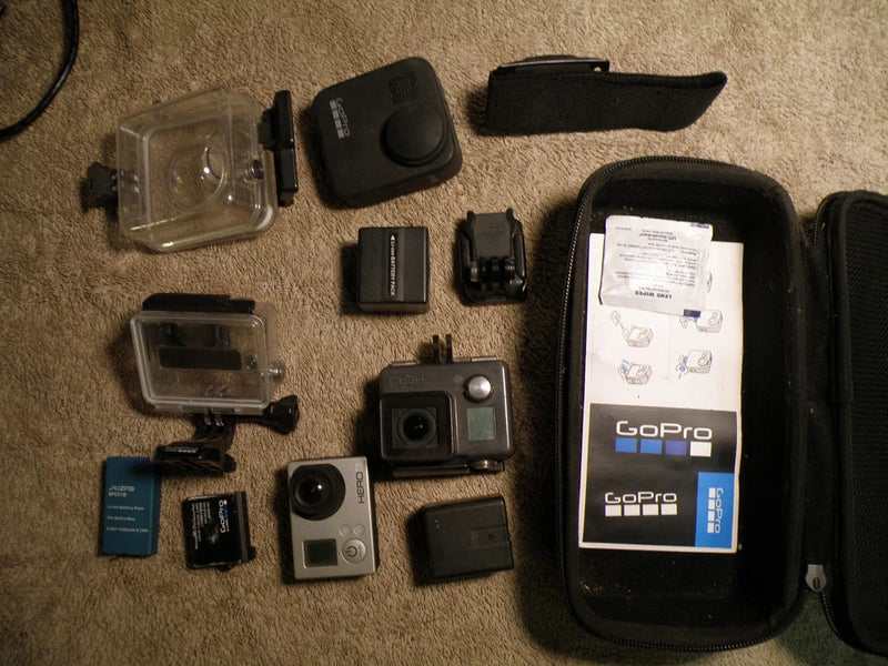 GoPro action camera accessories kit with protective housing and mounts