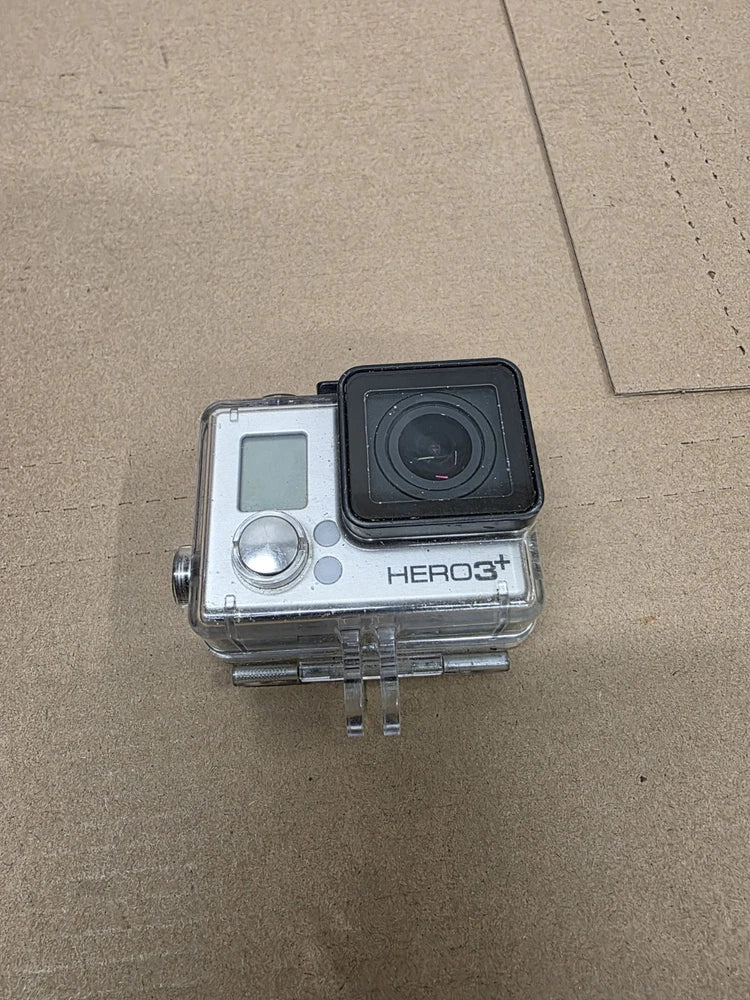 GoPro HERO3+ action camera with waterproof housing, clear front and black lens case