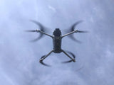 DJI Air 3 drone with four rotors and foldable arms