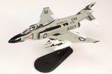 Hobby Master 1/72 F-4J Phantom II jet model on black display stand, gray with US Navy markings