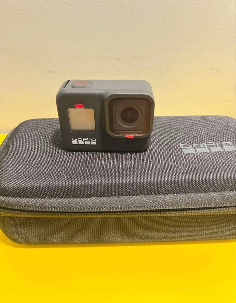 GoPro Hero 8 sport camera, black front view with lens and side display