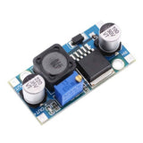 Blue LM2596S DC-DC step-down module PCB with capacitors, regulator chip, and pins