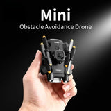 Mini obstacle-avoidance quadcopter drone, black with orange prop tips, camera front