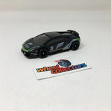 Black and green die-cast toy sports car with Hot Wheels Collectors card