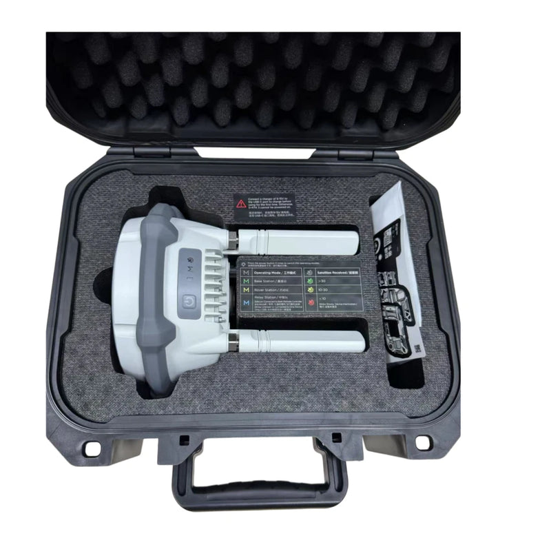 DJI D-RTK 3 multifunctional station in open hard case with attached sensor unit