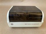 GE battery charger with smoked black top, labeled Battery Charger