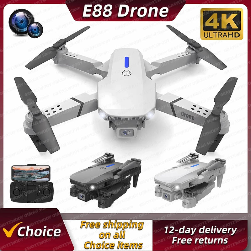 Foldable RC quadcopter drone with dual cameras and four propeller arms