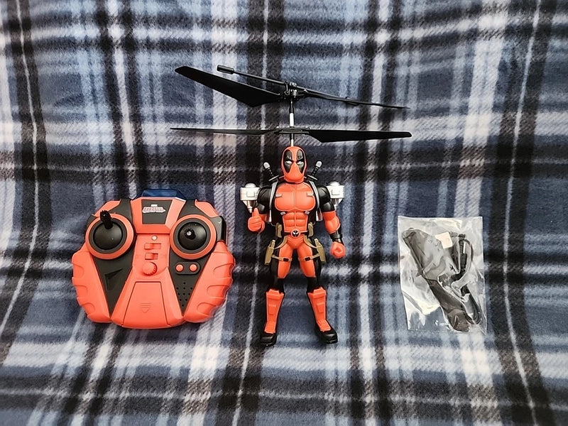 Remote control drone set with orange controller and orange action drone figure