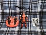 Remote control drone set with orange controller and orange action drone figure