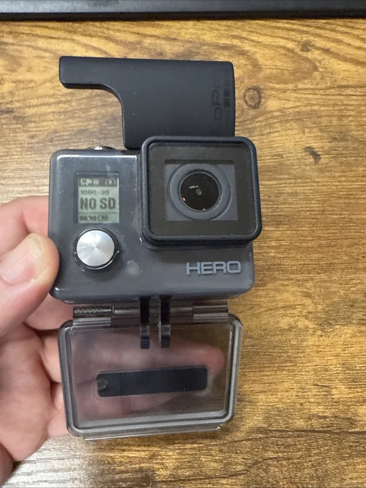 GoPro HERO Original action camera in clear waterproof housing with front lens and buttons