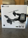 SILUROID quadcopter drone with camera on retail box, black 4-blade design