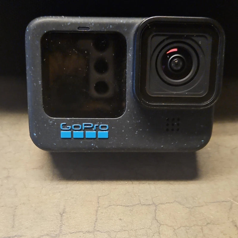 GoPro action camera in black, front view with lens and status screen