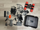 DJI Mavic drone kit with controller, extra batteries, prop guards, and hard case