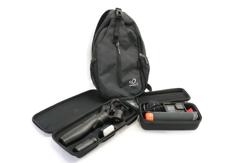 Black action camera accessory kit in hard case with zip pouch and mounted camera parts