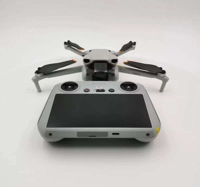 DJI Mini 3 drone RC controller with built-in screen and dual joysticks, gray