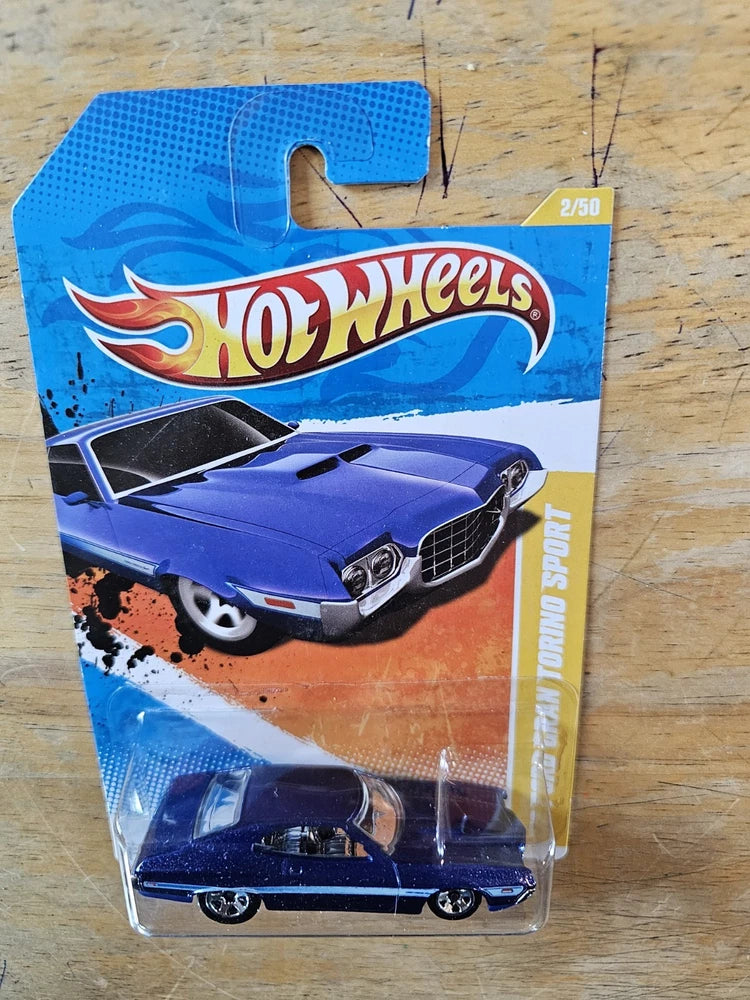 Hot Wheels '72 Ford Gran Torino Sport blue die-cast car in blister pack, 2/50