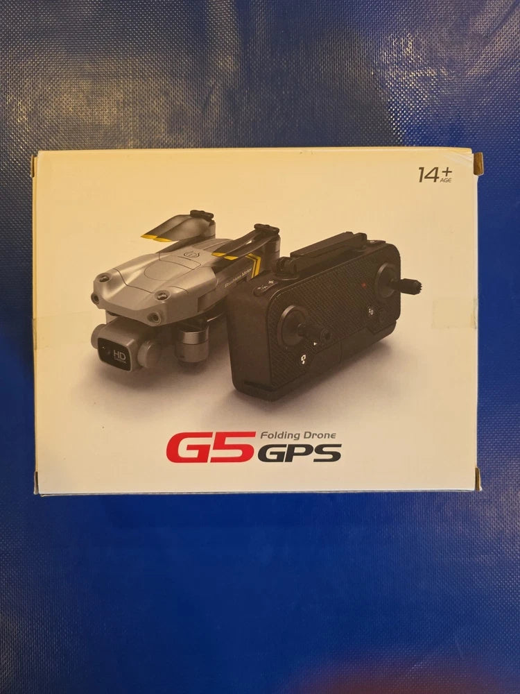 G5 folding GPS drone in box, side view with propellers