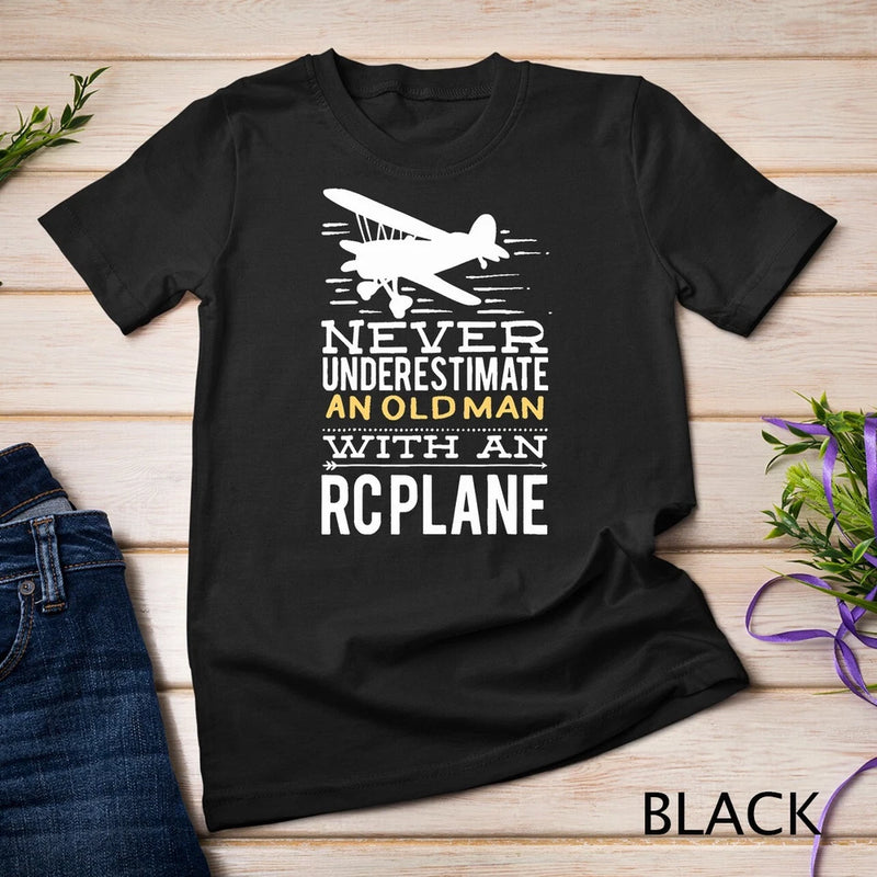Black unisex T-shirt with white RC plane graphic and Never underestimate text